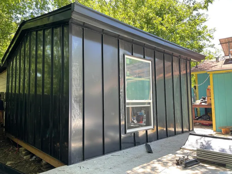 Black standing seam metal wall panels for Roof Inspection in Ulysses