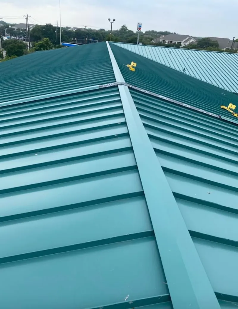 Green commercial metal roof ridge and valley for Metal Roof Repair in Ulysses
