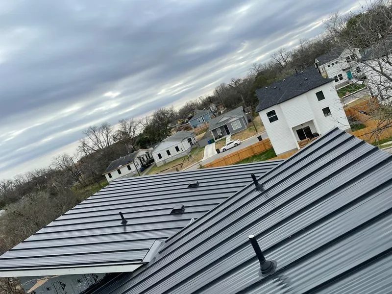 Standing seam metal roof panels with vents for Skylight Repair in Ulysses